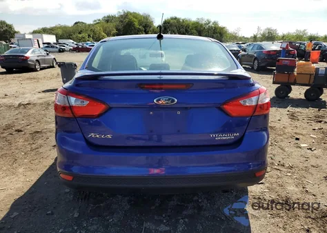 2013 Ford Focus Titanium z USA, uszkodzony, nr VIN 1FADP3J21DL255104